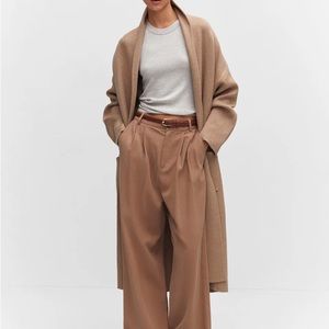 Oversized knitted coat with pockets